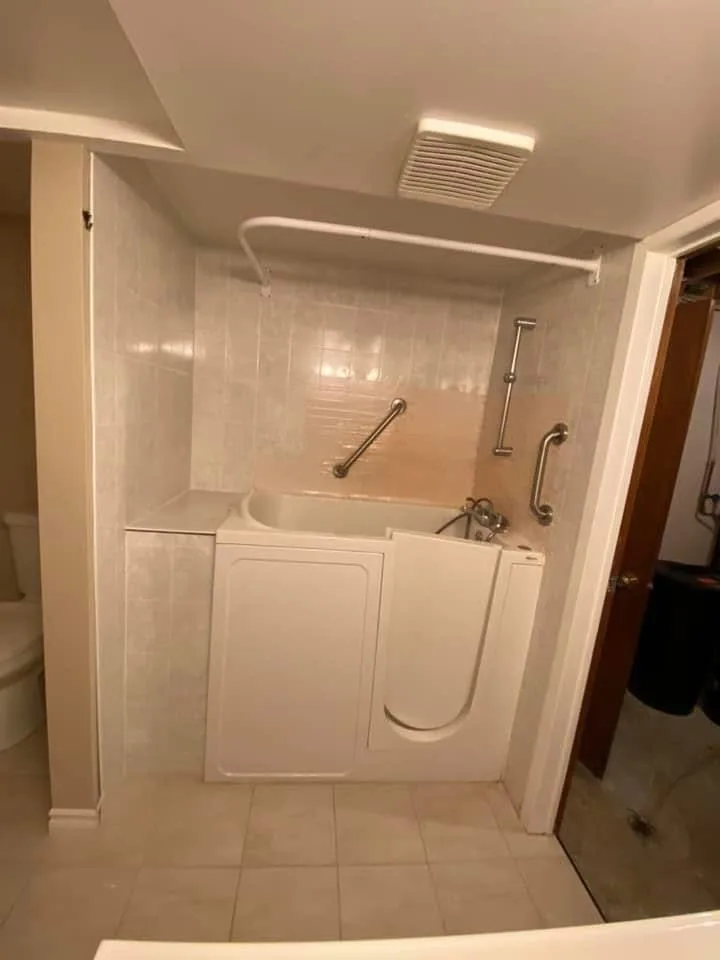Walk-in tub before the shower conversion